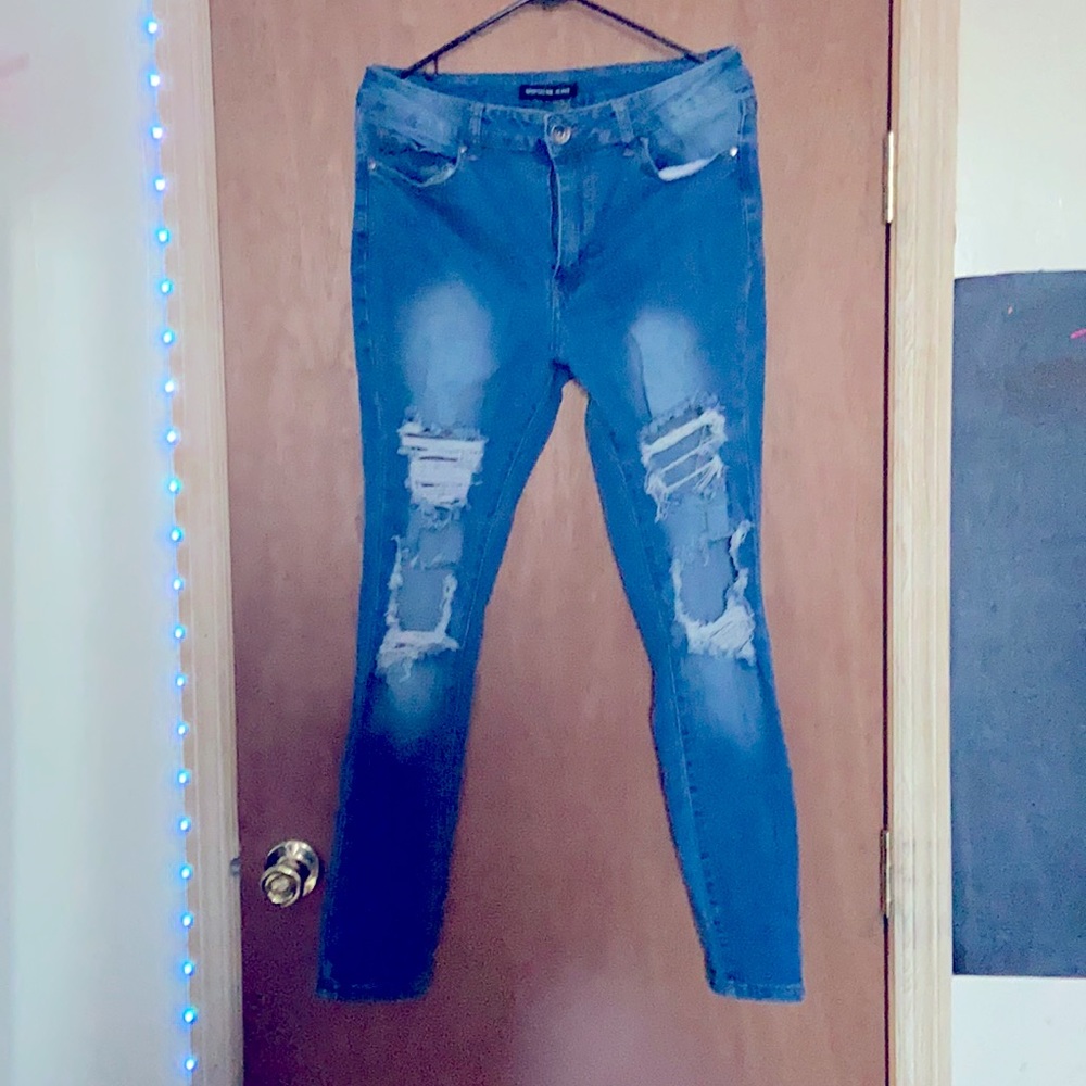 Serpentine distressed skinny jeans